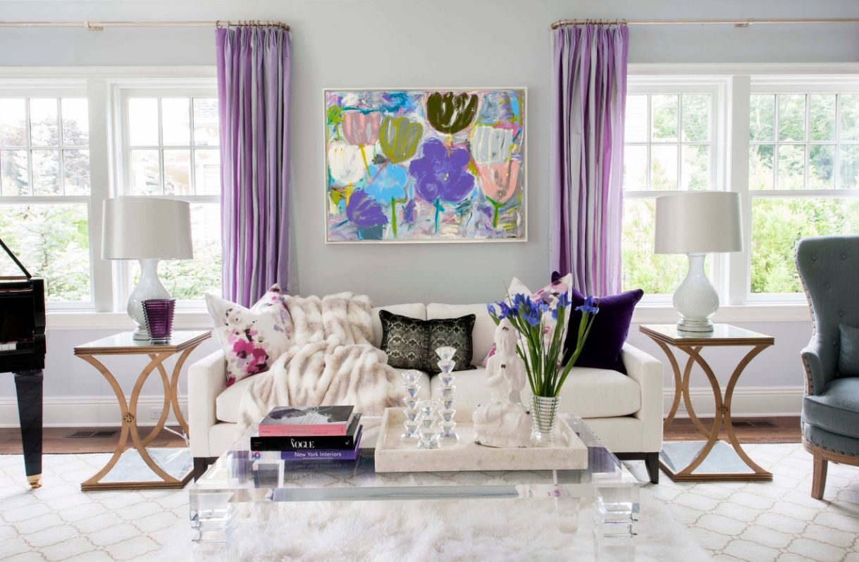 Living room with modern furniture and purple curtains