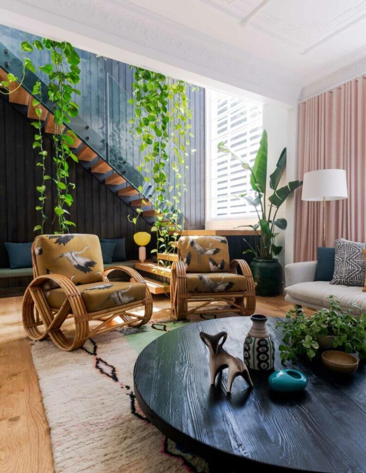 Living room with staircase by Jase Sullivan