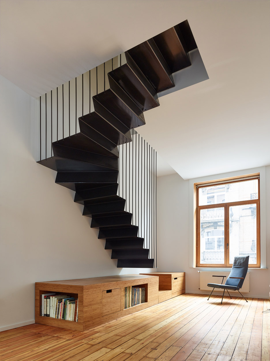 Living room with steel hanging stair