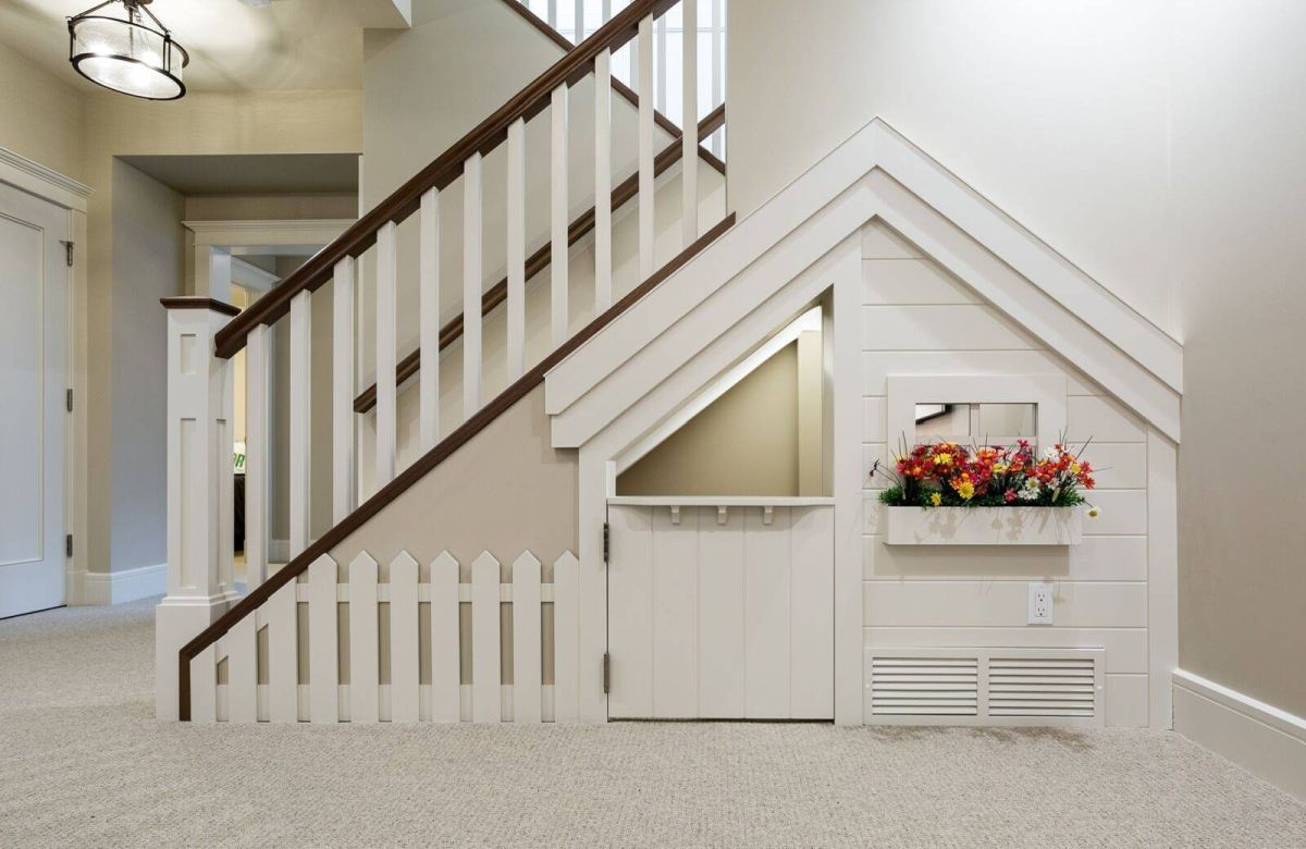 Living room with understairs playroom for kids