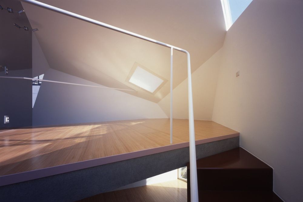 Loft area in Micro concrete house Reflection of Mineral