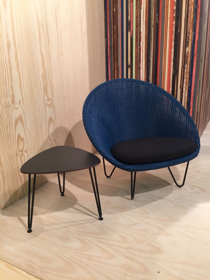 Low armchair with hairpin legs and coffee table