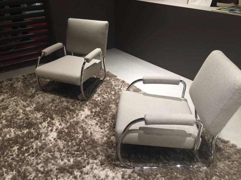 Low armchairs with a stainless steel frame