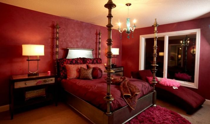 Low ceiling romantic bedroom in deep red