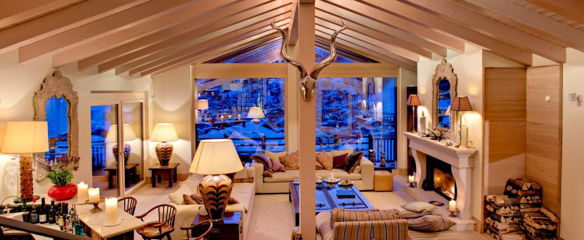 Luxury Chalet Grace, Zermatt, Switzerland Living area with fireplace