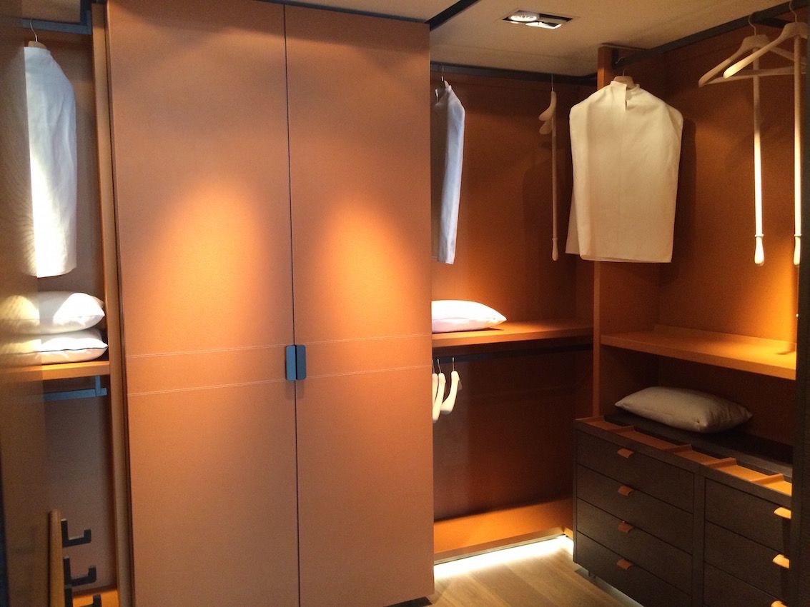 Closet renovations are an example of an area where the budget can skyrocket. Adding lighting and luxe details like a leather covering in this closet doing from 4141 Design in Miami can add to the cost. The are endless options that will function as well, but don't have to be so over-the-top.