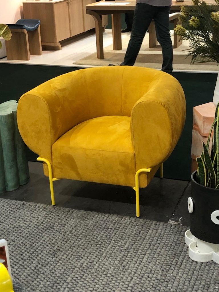 Overstuffed and sunny yellow, this chair makes everyone smile.