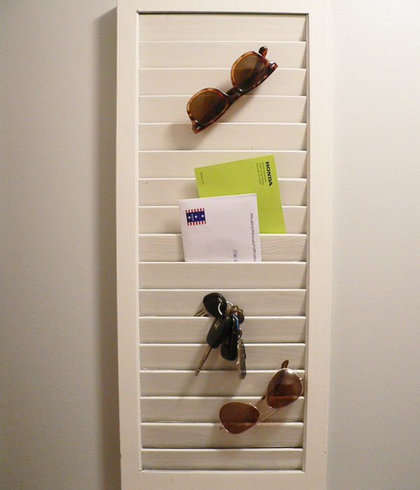 Mail storage and sunglases holder