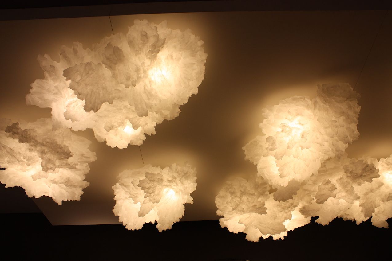 Like crystalline clouds, the installation includes a set of seven lights.