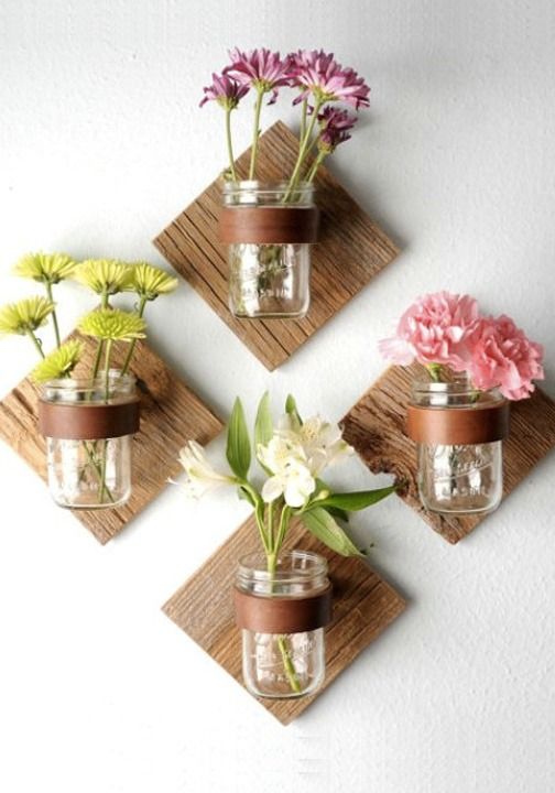 Mason jars flowers on wall