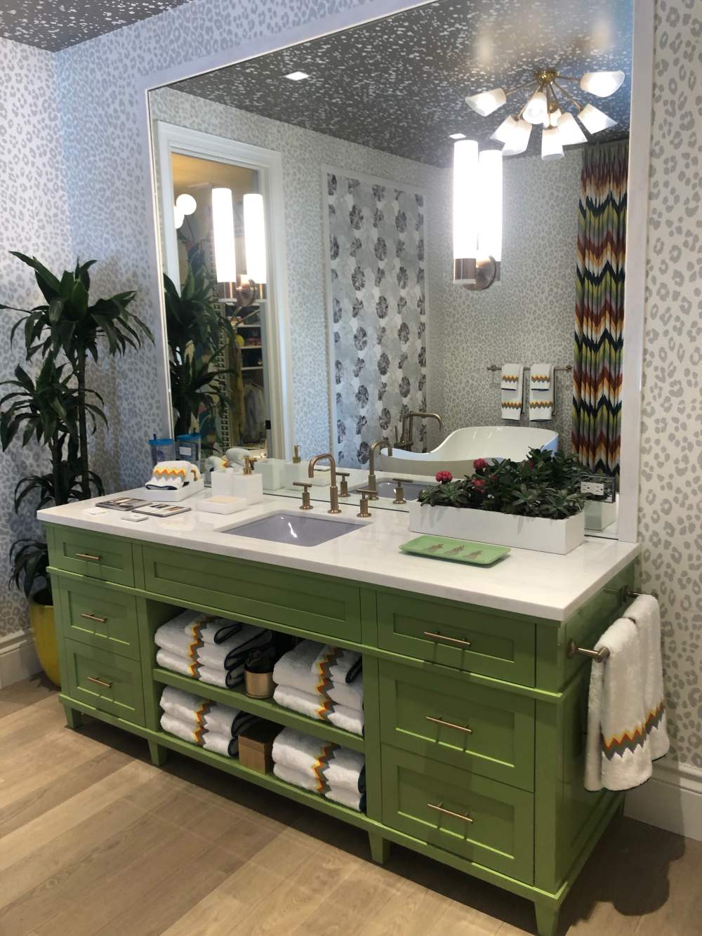 Master bathroom with green vanity