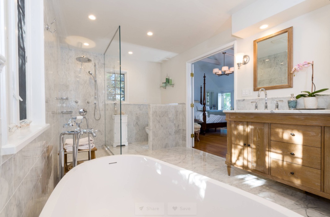 Master bathroom with walk in shower and bathtub