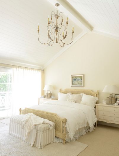 Master bedrom with a vaulted ceiling