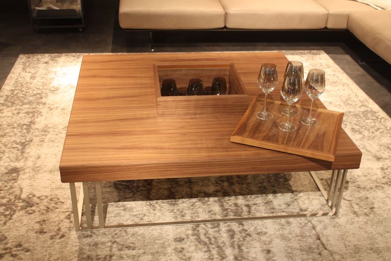 Acclaimed for its seating and sofas, MaxDivani also has this great wood coffee table that has a tray and secret storage. perfect for the who like to entertain, its fun as well as useful.