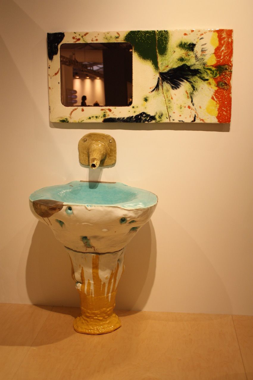The glazes the artist uses are unpredictable, resulting in different color expressions, which only add to the unusual nature of the sink and mirror.