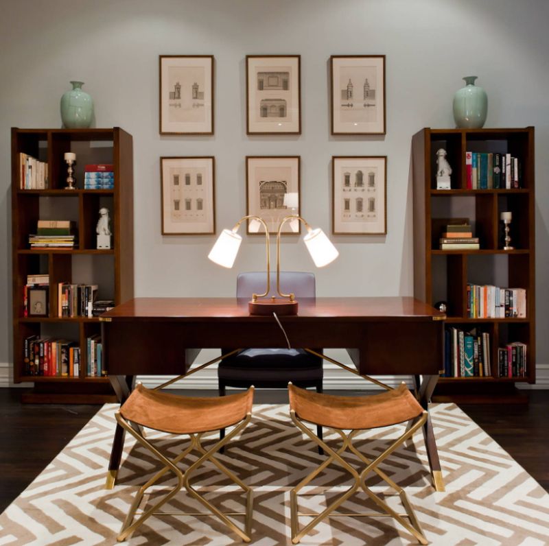 Mid sized transitional freestanding desk dark wood floor study room