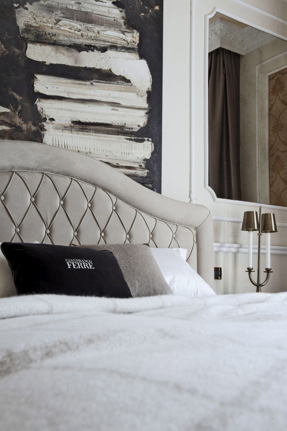 The Ferre brand label can be seen on the pillows.