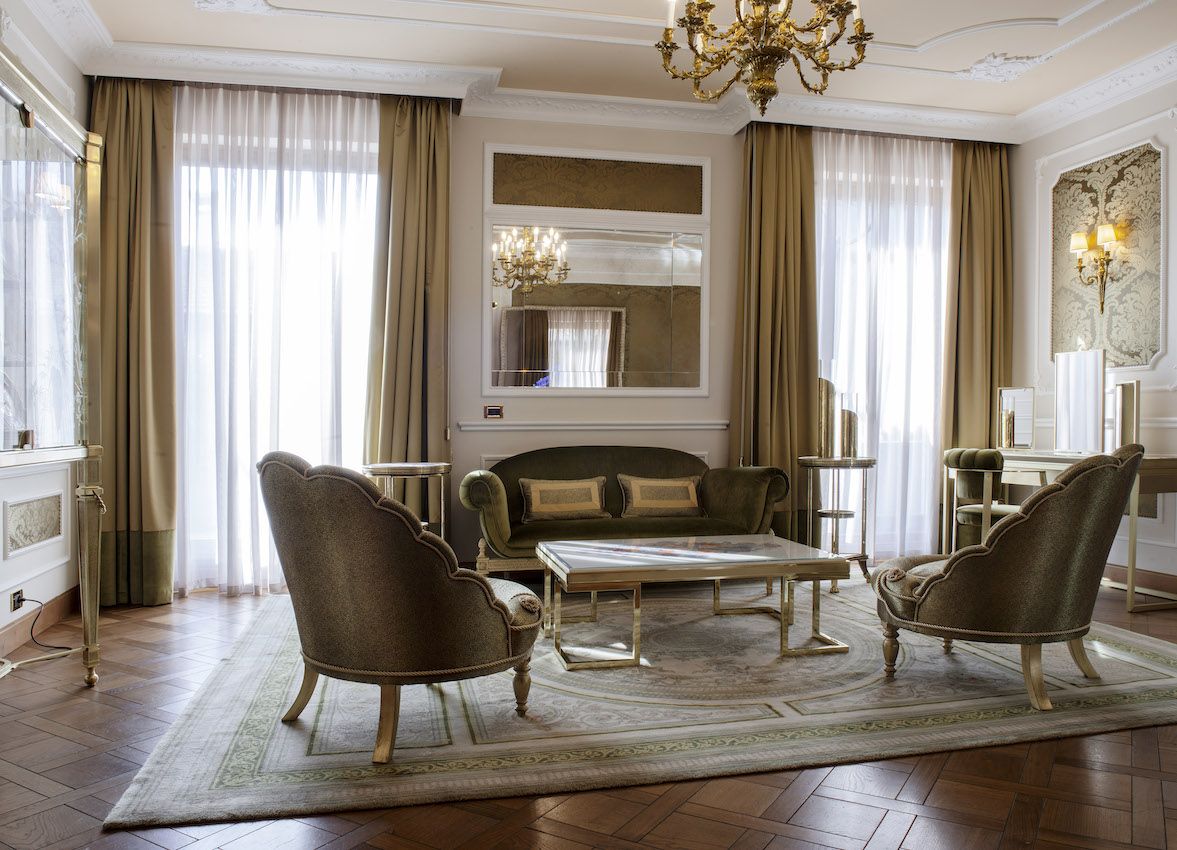 A magnificent sitting room is with opulent furniture is part of the suite.