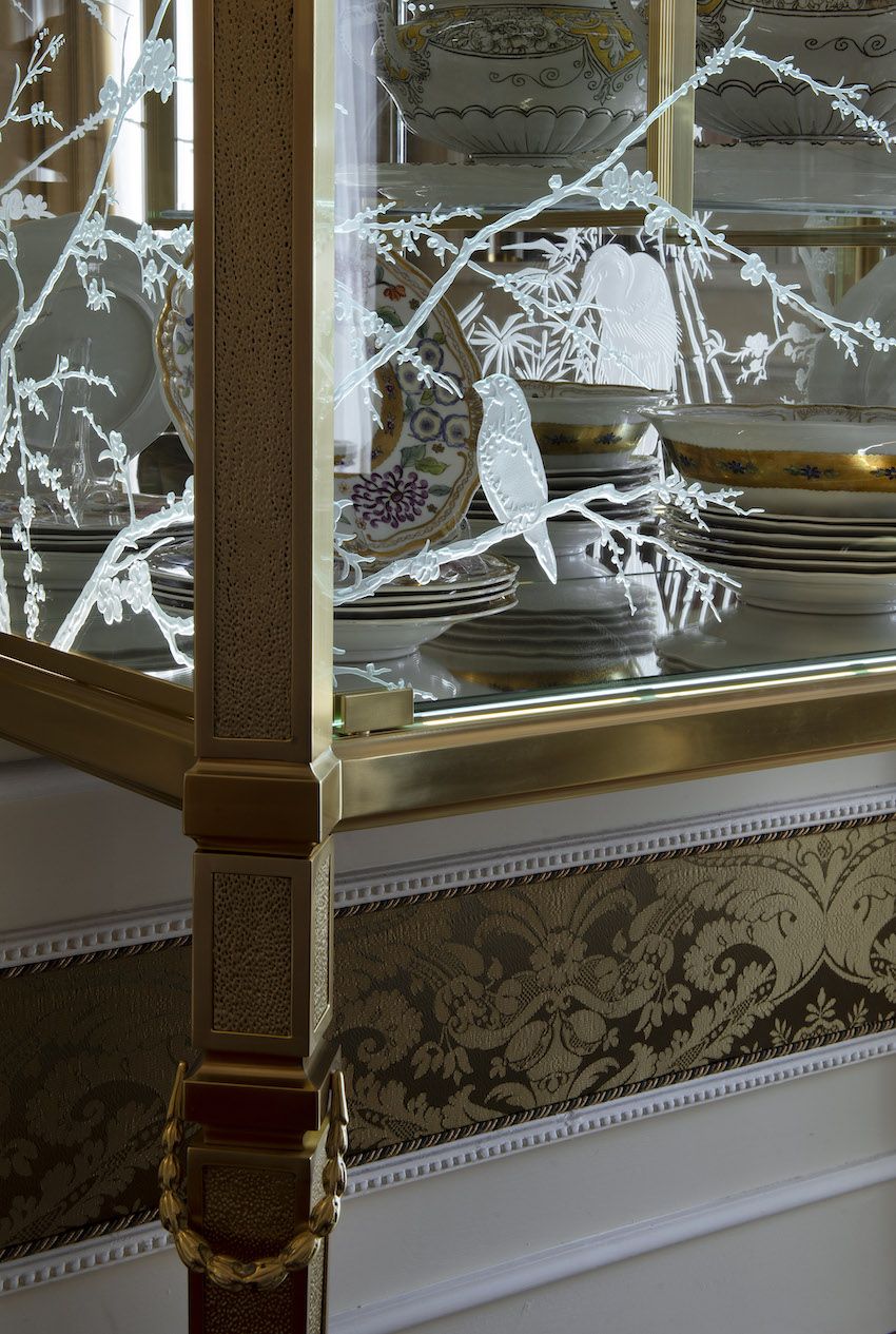 Opulent details can be found on every piece in the room.