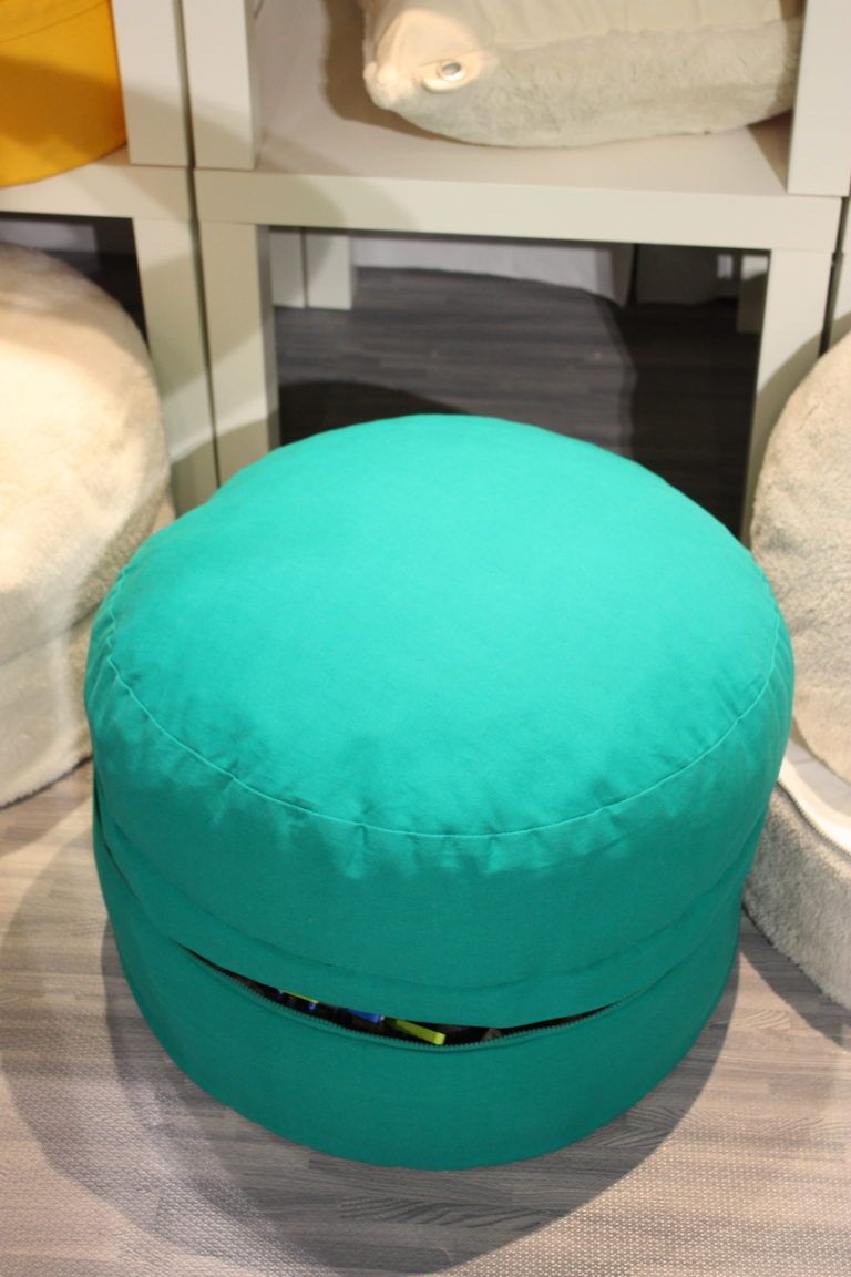 This family friendly ottoman hides a wealth of storage space.