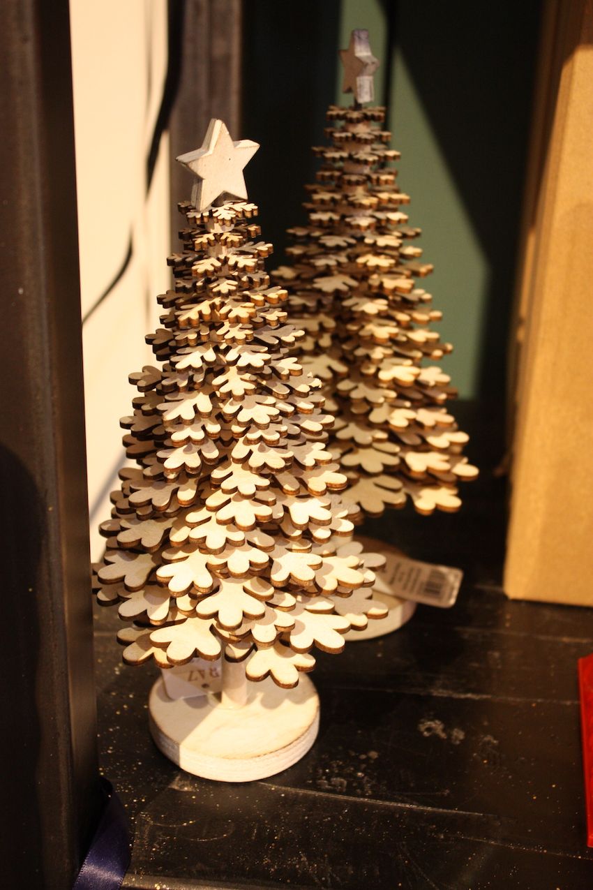 Wooden mini trees add a rustic element to any room.