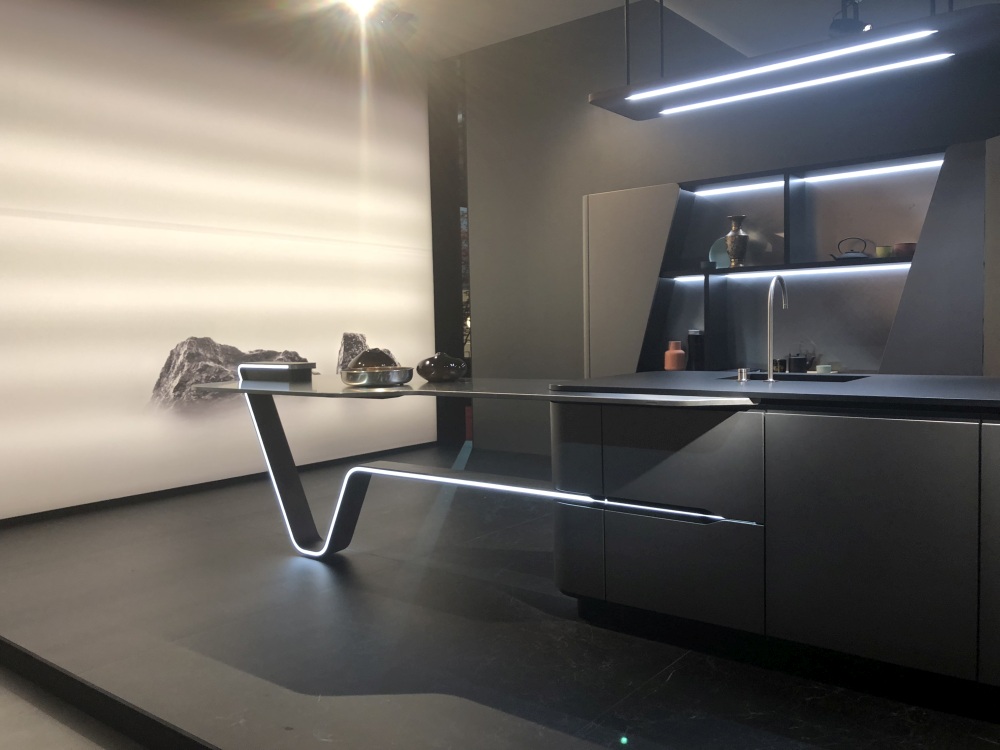 Minimalist kitchen design with LED light strip for island