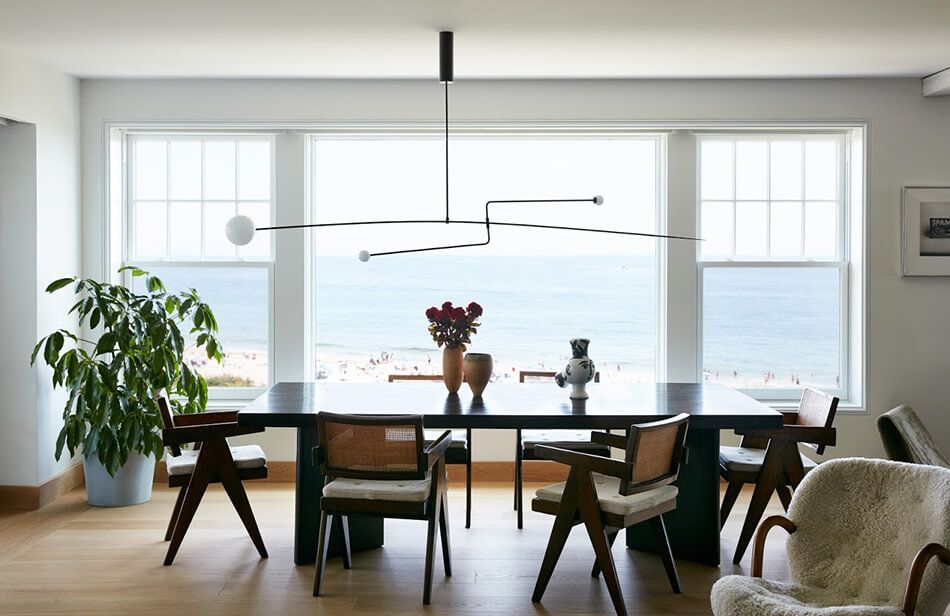 Minimalist lighting fixtures over dining table