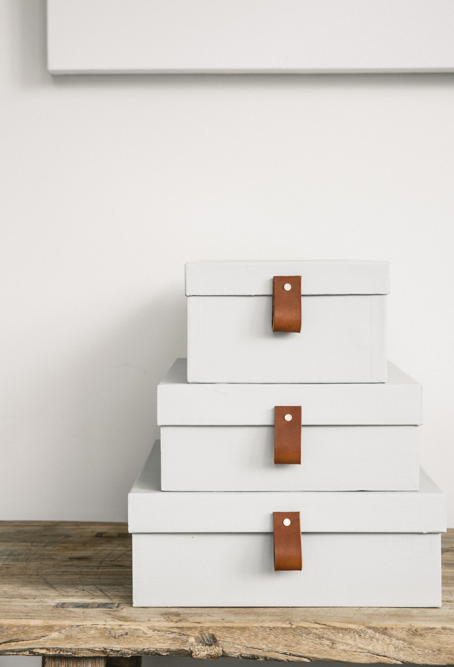 Minimalist stacked boxes with leather details