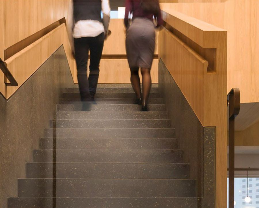 Minimalist wood railing with built in handrail