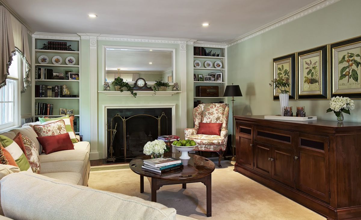 Mint green traditional living room with brown furniture