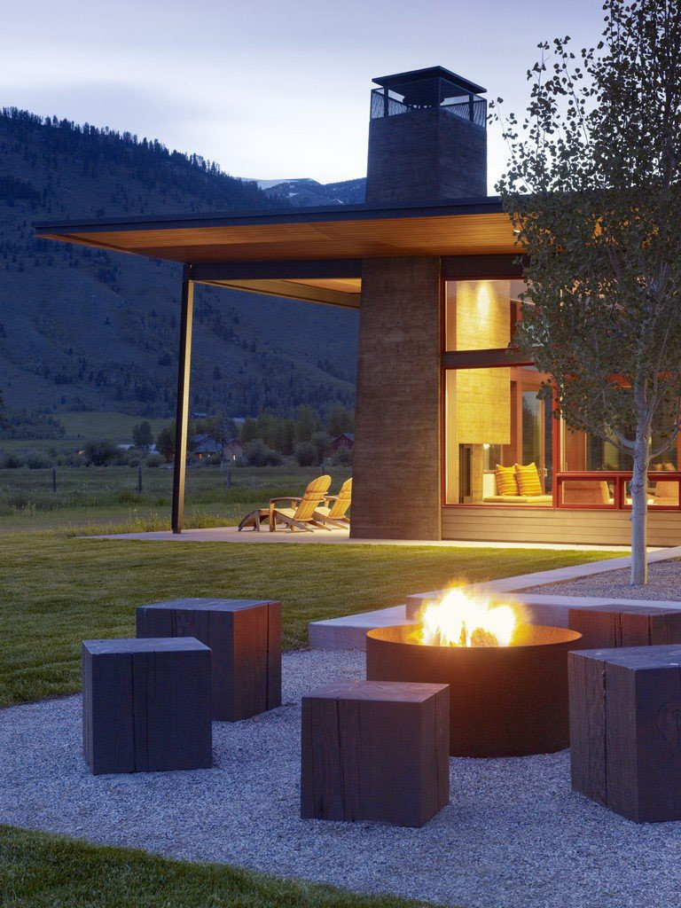 Moden House Architecture with An outdoor Fire pit Seating