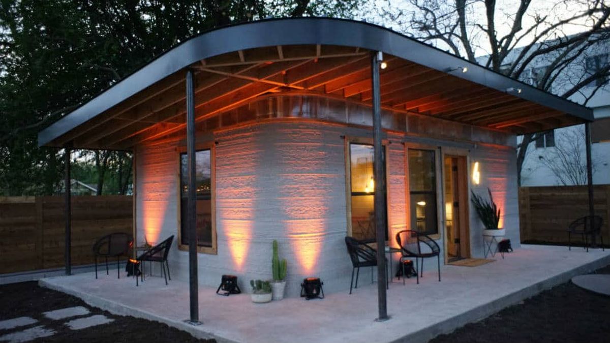 Modern 3D printed home by Icon with small porch