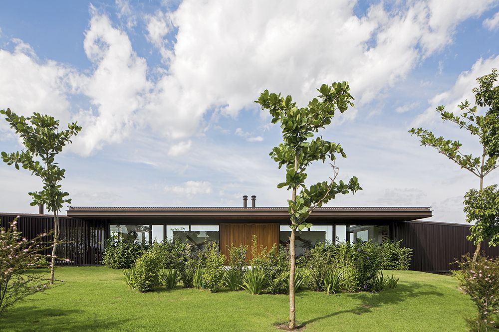 Modern design of a house with a big front yard