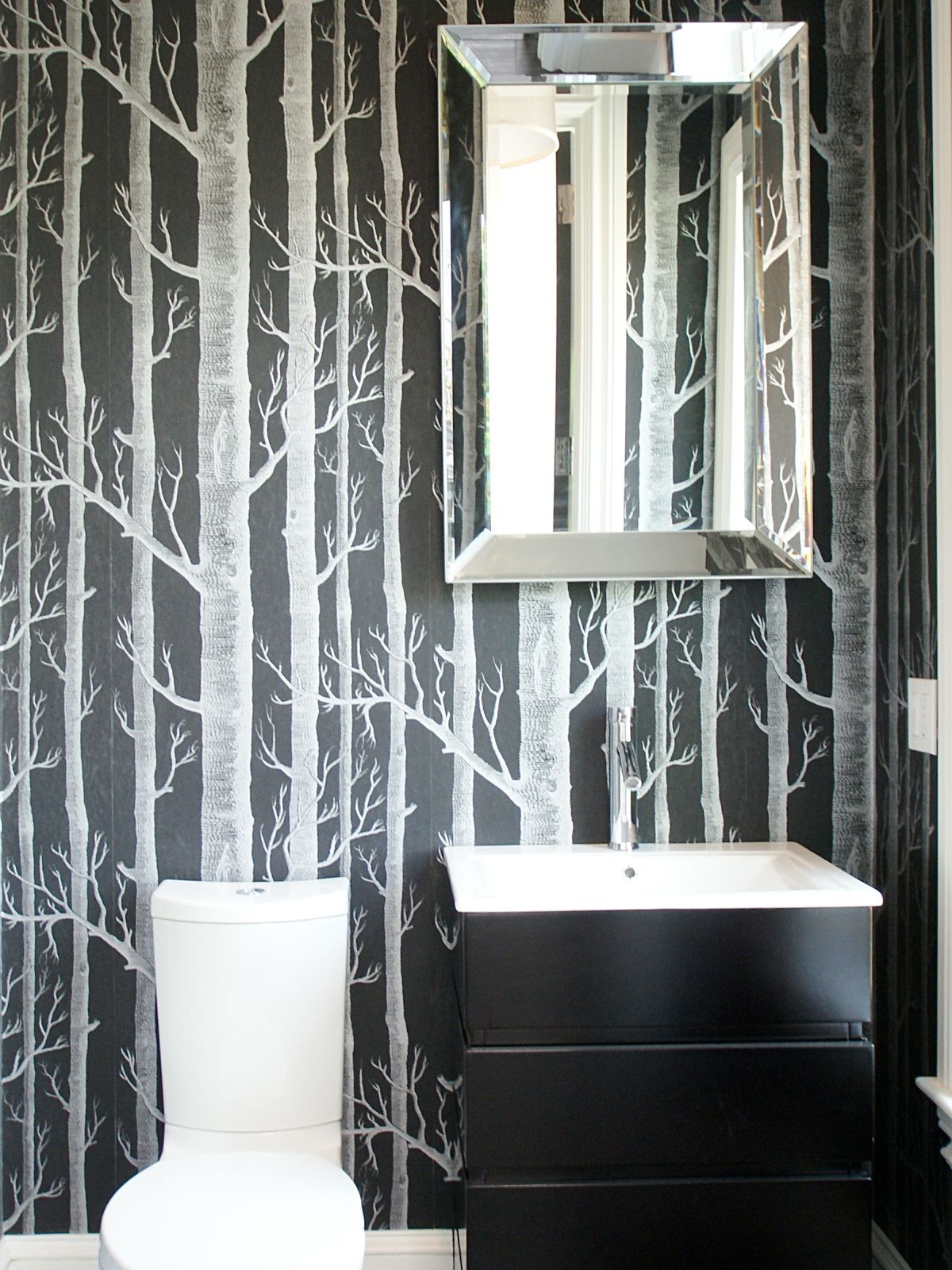 Modern bathroom with a tree birch wallpaper