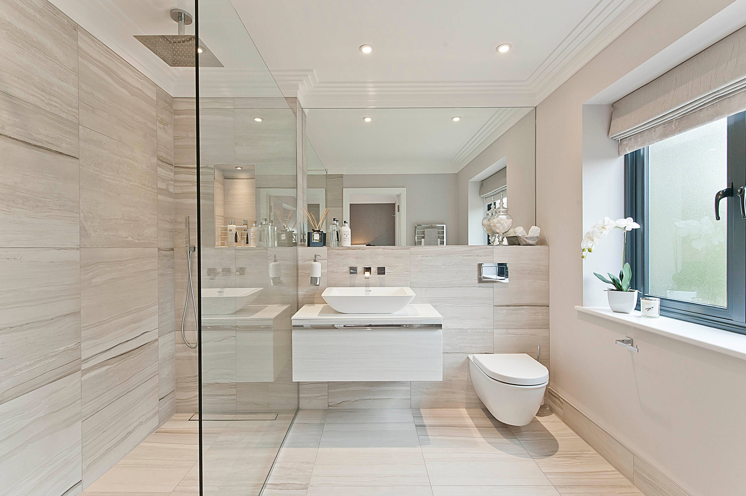 Modern bathroom pale wood walls sink