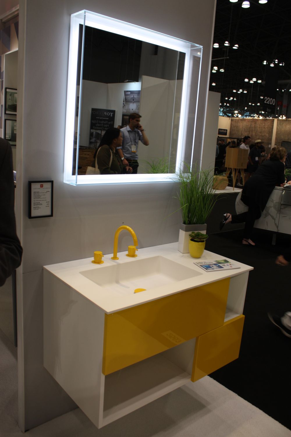 Modern bathroom vanity in white with yellow accents