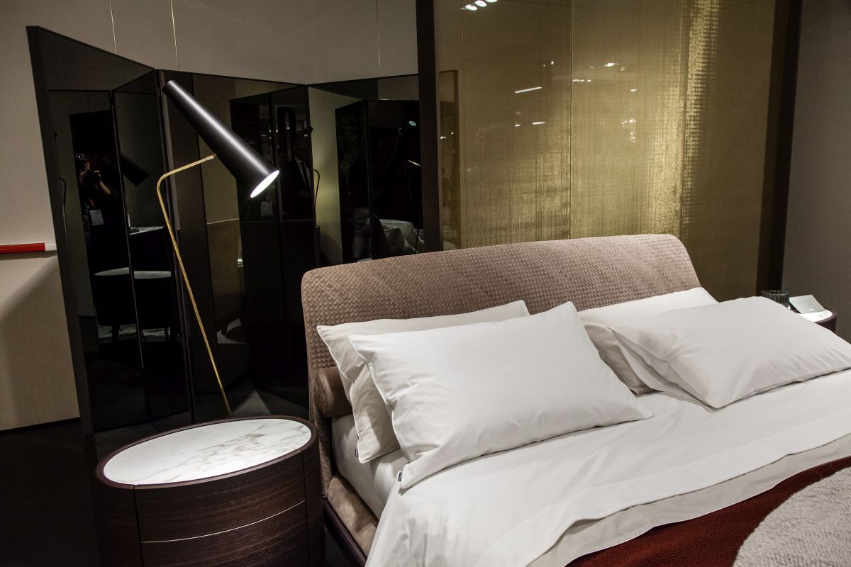 Floor lamps work at the bedside too.