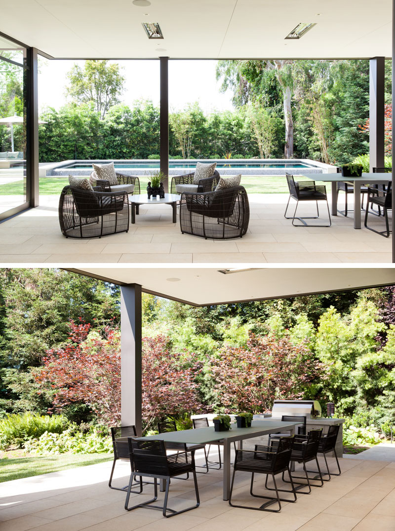 Modern covered patio area with a dining set