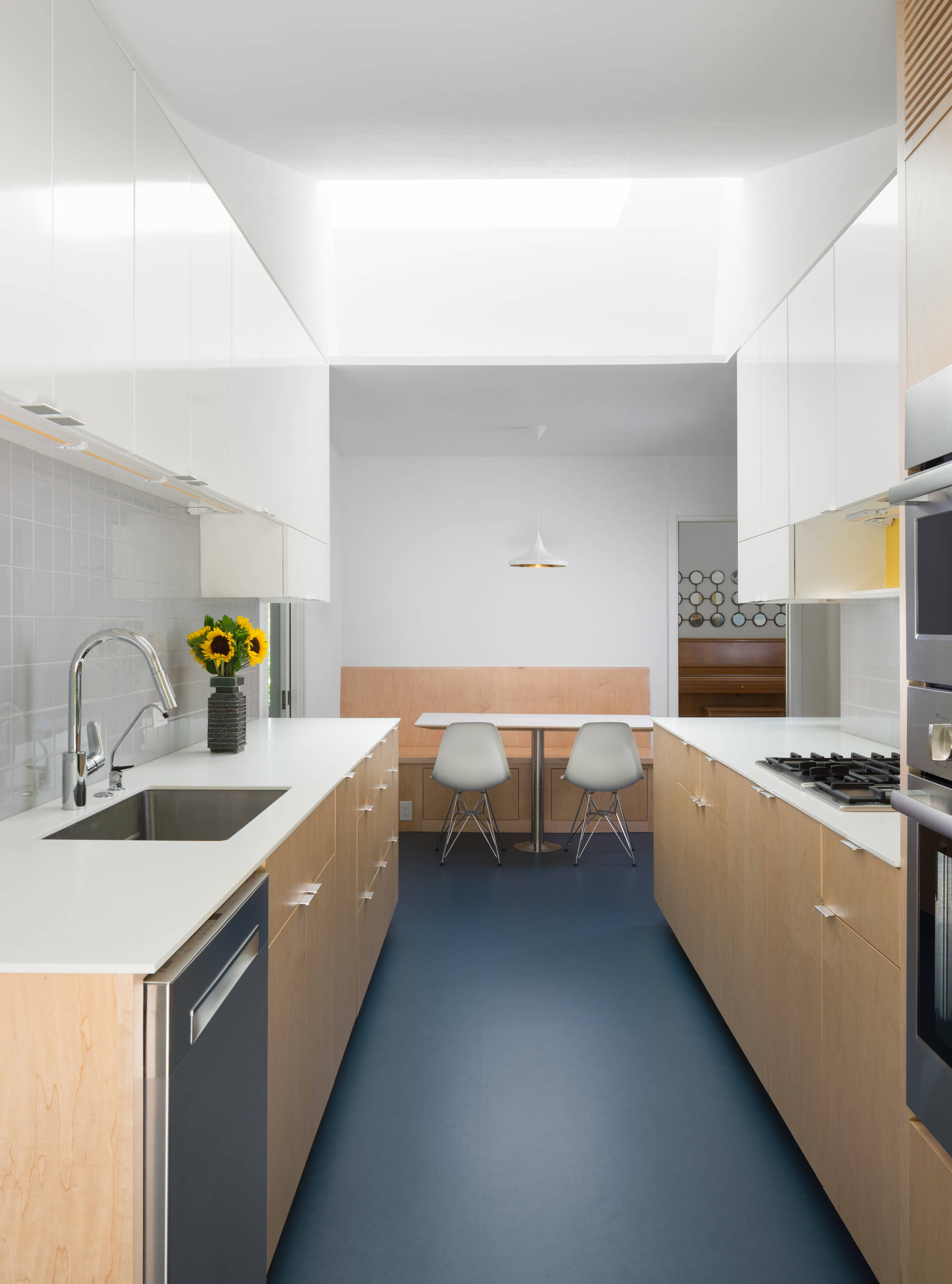 Paint a floor in a galley kitchen.