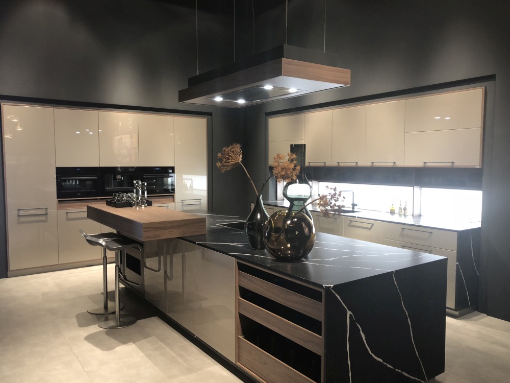 Modern kitchen with waterfall black marble countertop