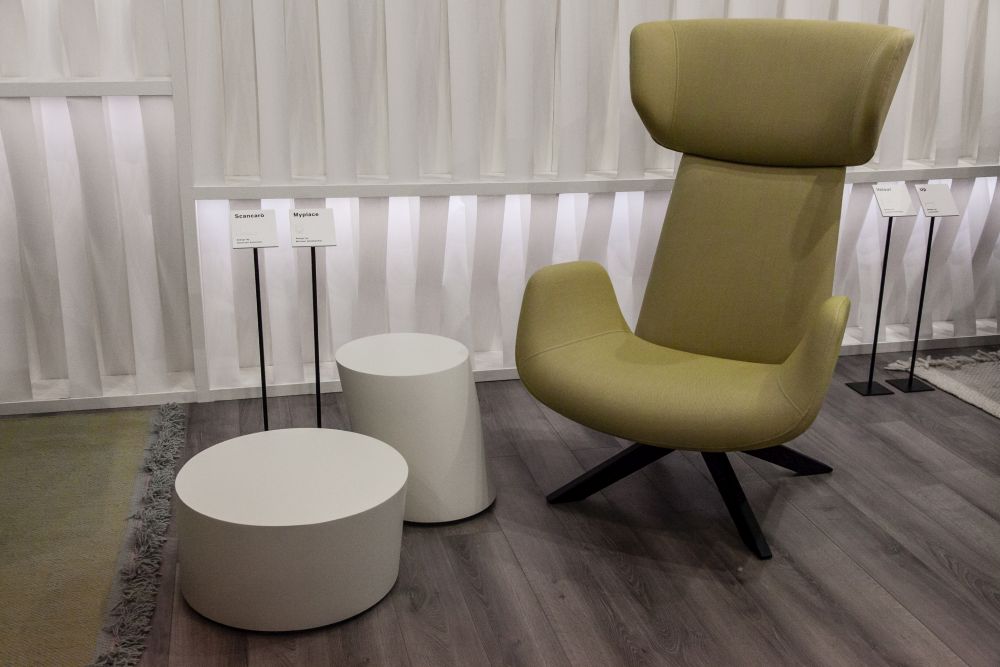 Ottomans are great because they can double as tables and go well with lounge chairs