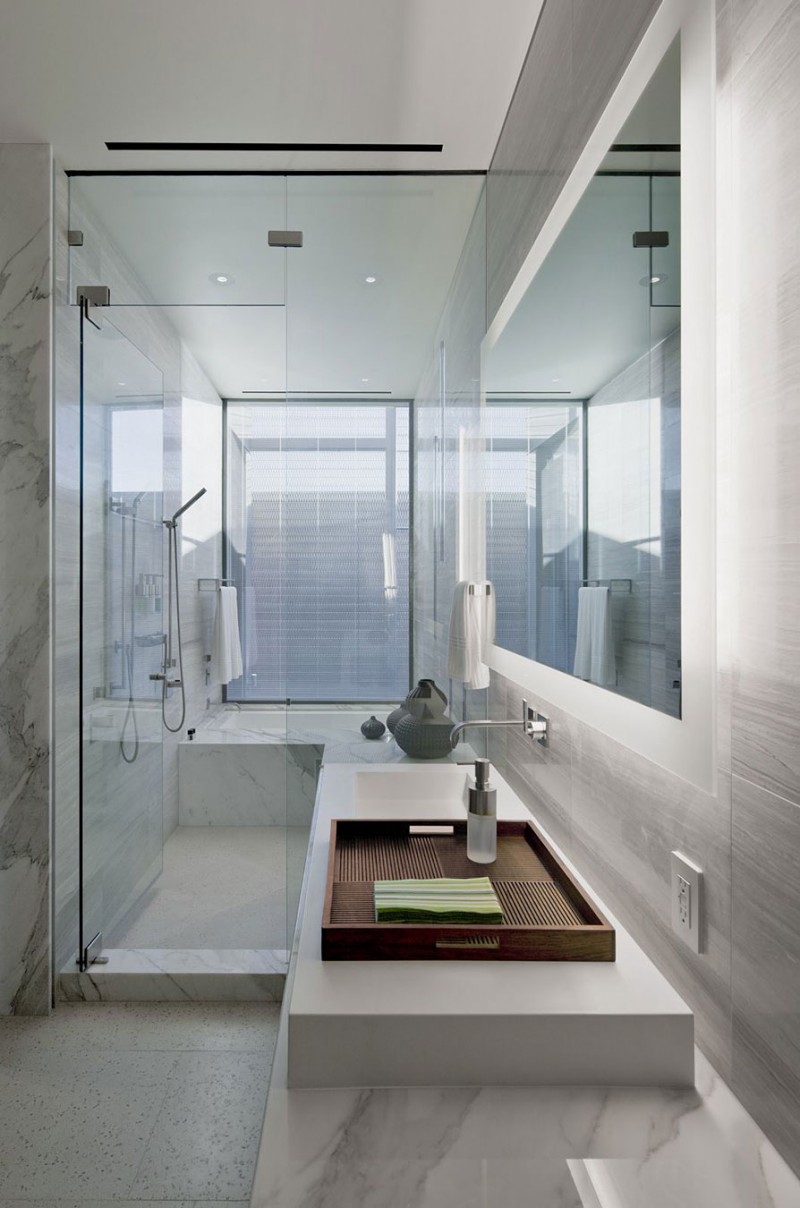 Modern residence with marble white bathroom