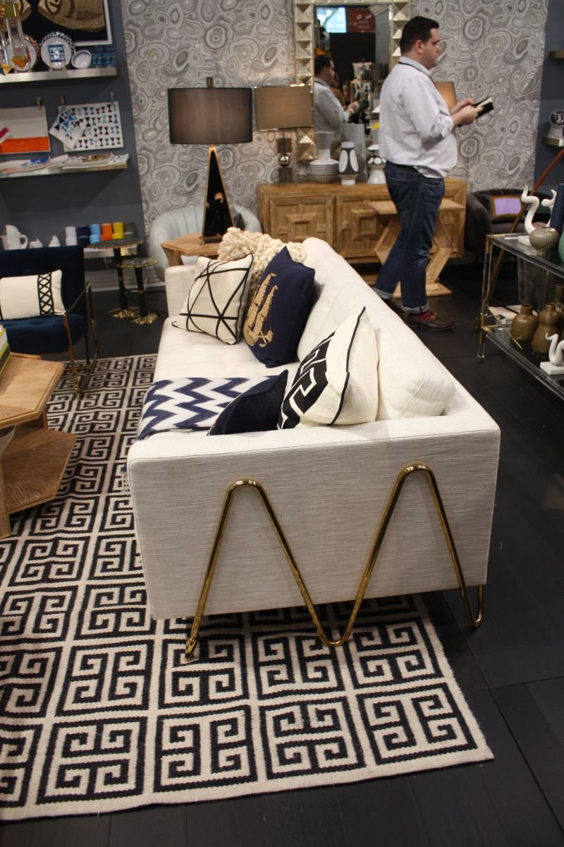 Modern sofa with gold hairping legs