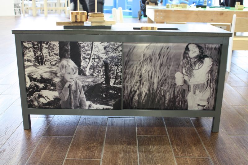 Among the customizing options is the possibility of having your own photos put onto the sliding doors of the cabinet. We love the black and white photos incorporated into this cabinet. You could also have your children's own artwork on the panels.