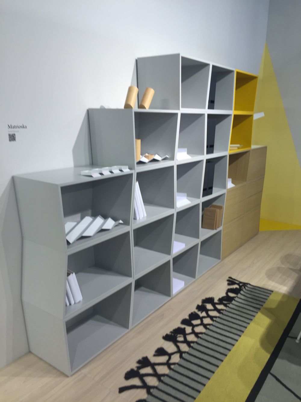 Modular bookcase in yellow green and gray