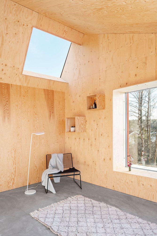 Monochrome House with plywood interior by Lookofsky Architecture- wall shelves