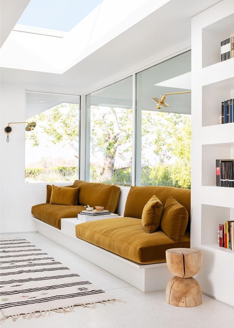 Mustard seating and wood stool from Sarah Sherman Samuel's