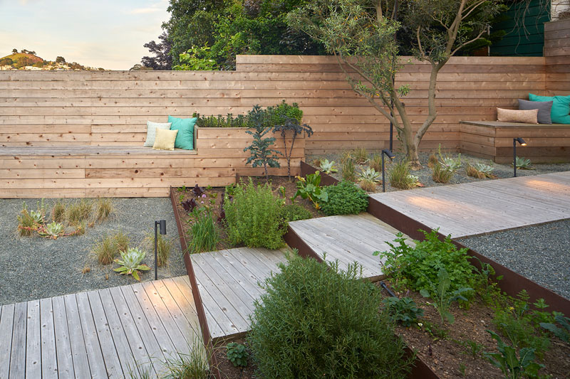 Narrow San Francisco Urban Garden - wooden deck and watering steel