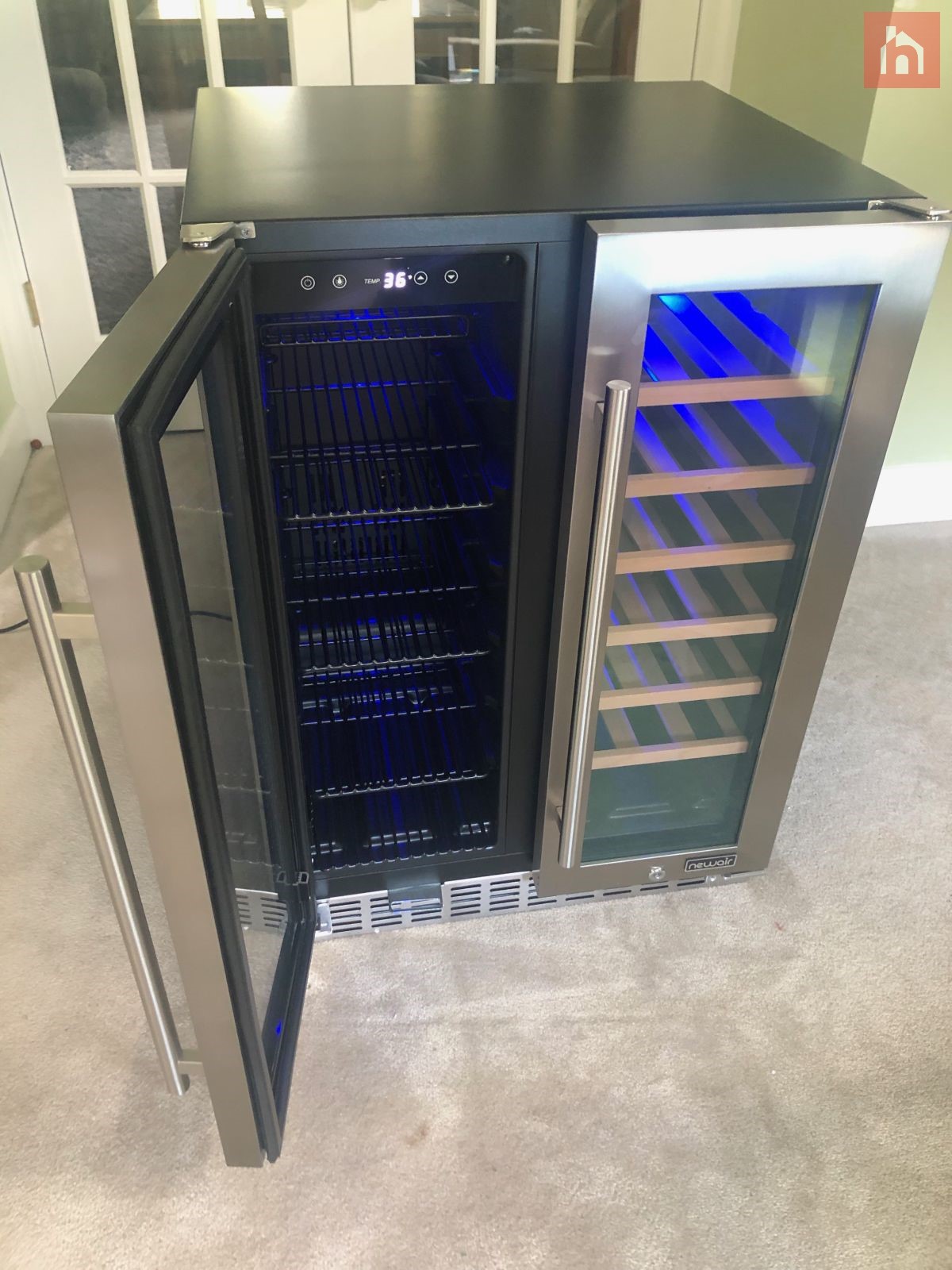 NewAir 24” Premium Built in Dual Zone 18 Bottle and 58 Can French Door Wine and Beverage Fridge beverage compartment
