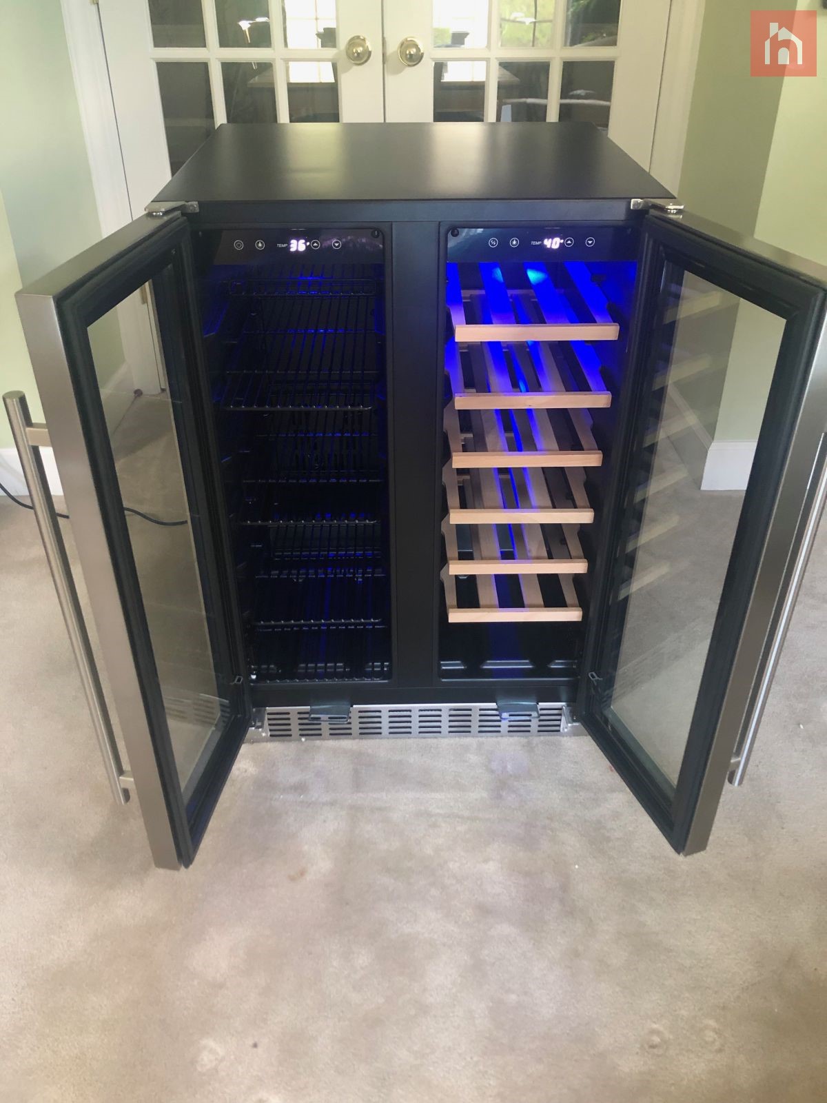 NewAir 24” Premium Built in Dual Zone 18 Bottle and 58 Can French Door Wine and Beverage Fridge open doors